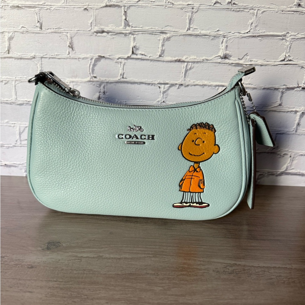 NWT Coach X Peanuts Teri Shoulder Bag WithFranklin CBJ80 Brand New price is firm